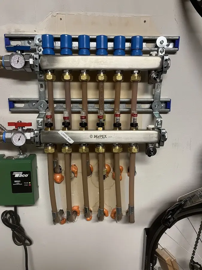 Plumber performing Water Heater Repair at a residential property in Lewes